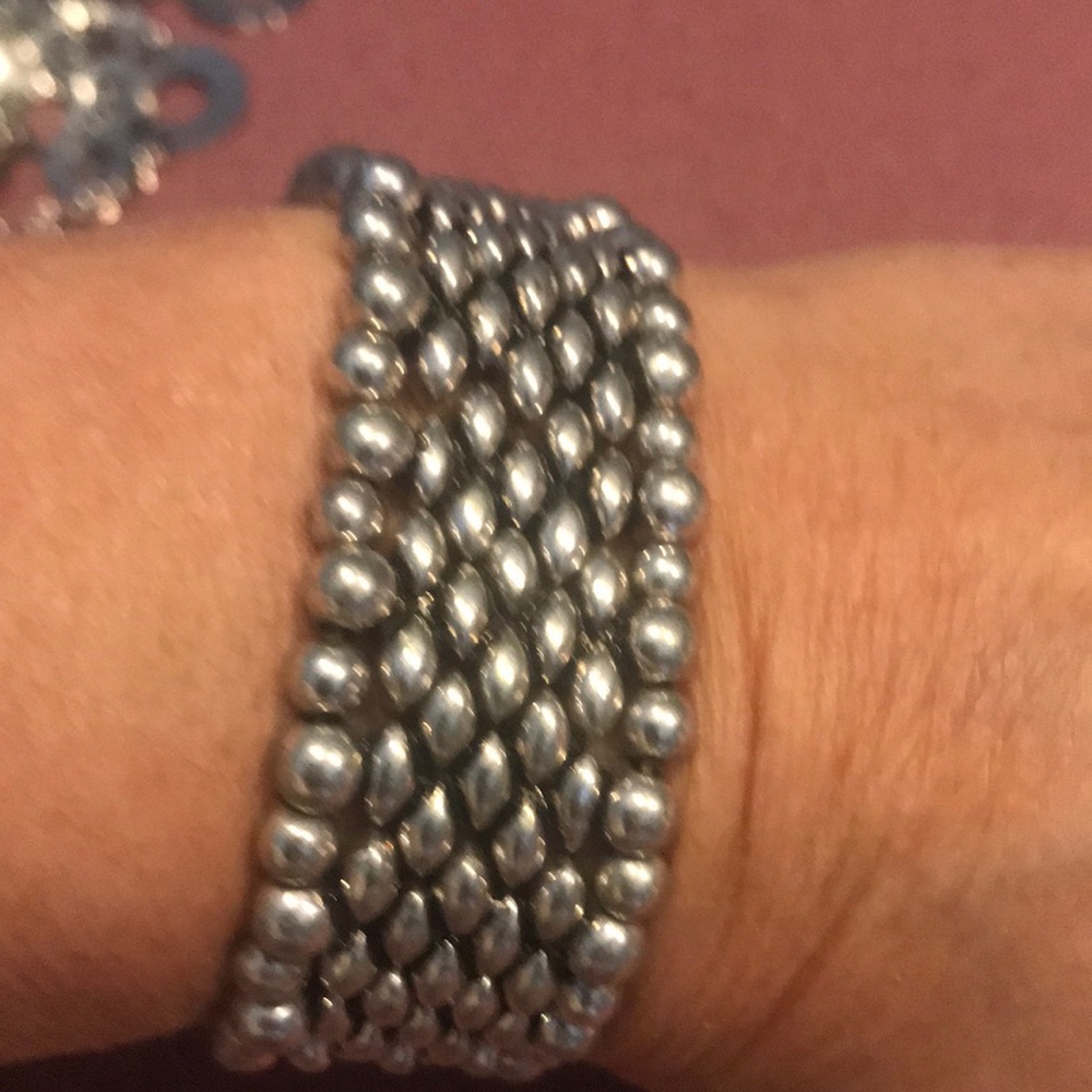 Weighty silver toned beaded stretch bracelet